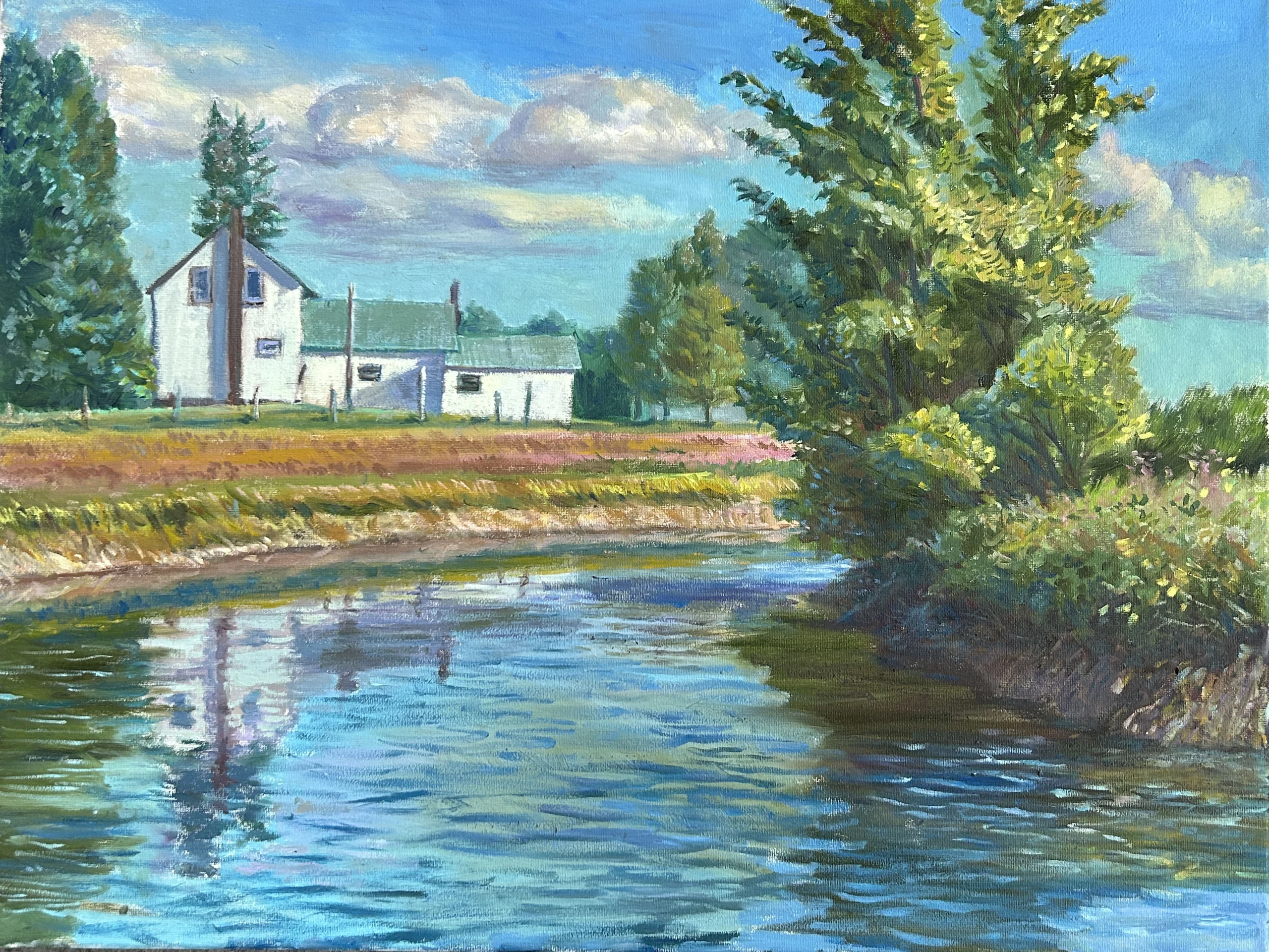 A landscape painting by the artist Patrick Fitzgerald featuring a white farmhouse by a calm river, with trees reflecting in the water. The scene is peaceful and bright under a blue sky.